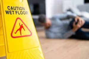 Slip and fall accident Caution: Slip and Fall Hazard - Floor Sign Ensuring Safety Measures